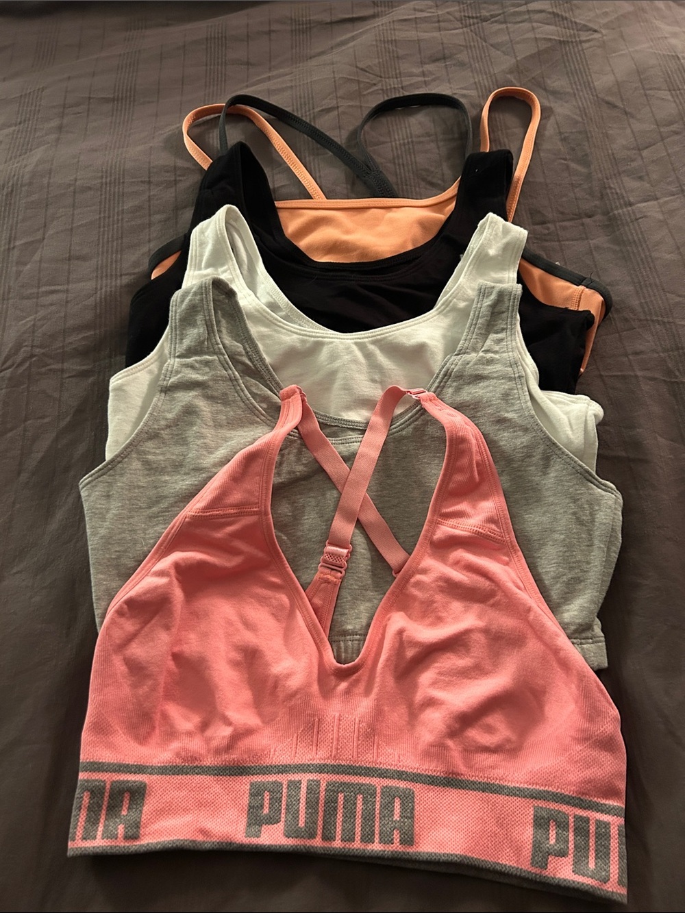 5 for $25! Mixed Pack Women’s Sports Bras in Pink, Coral, Black, White & Gray.